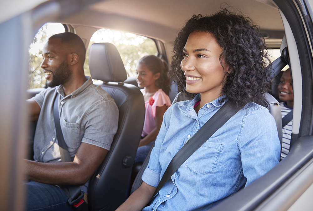 family driving in car